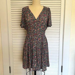 OYSHO FLORAL BUTTON FRONT MINI DRESS. FLUTTER SLEEVE AND TIE IN BACK. SZ L